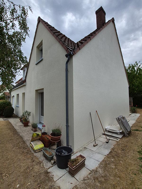 Angle d'une maison après ravalement imperméabilité peinture